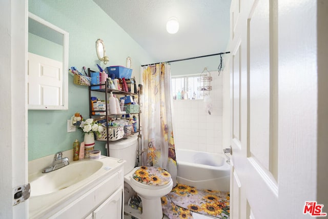 full bathroom with vanity, shower / bathtub combination with curtain, a textured ceiling, and toilet