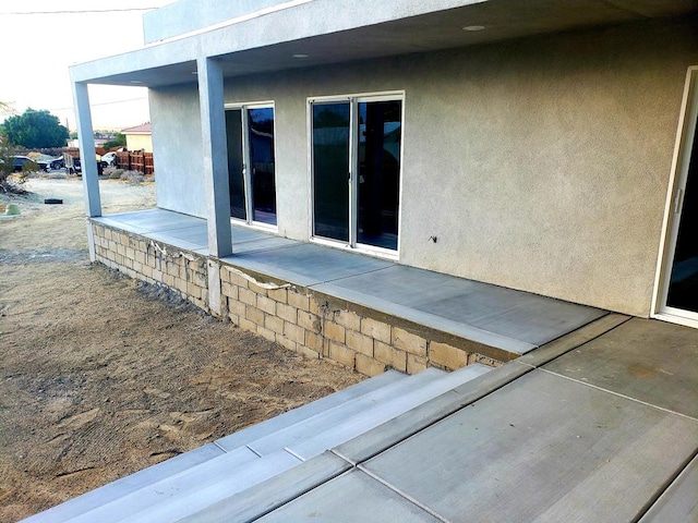 view of home's exterior featuring a patio