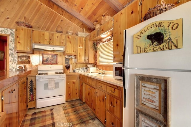 kitchen with vaulted ceiling with beams, white appliances, sink, and wooden ceiling