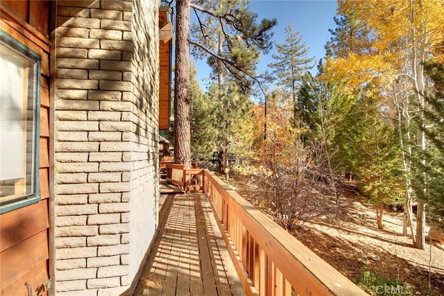 view of side of property featuring a balcony