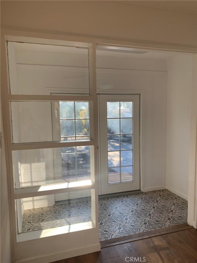 doorway featuring hardwood / wood-style flooring