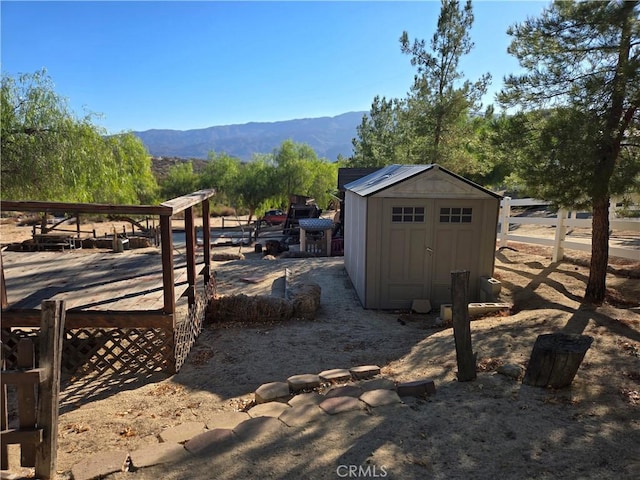 view of outdoor structure featuring a mountain view