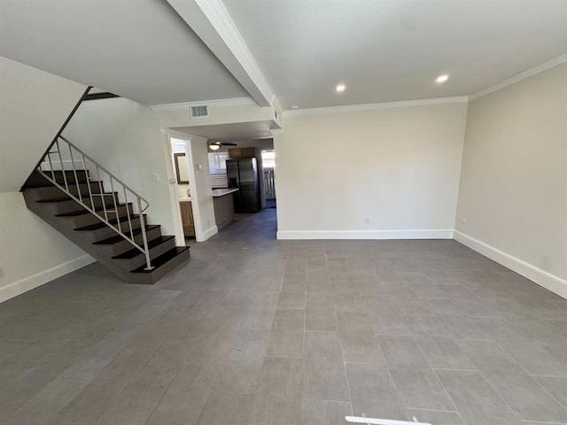 unfurnished living room with crown molding and light hardwood / wood-style flooring