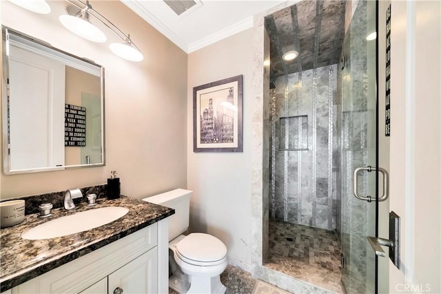 bathroom featuring vanity, toilet, crown molding, and walk in shower