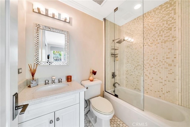 full bathroom with vanity, enclosed tub / shower combo, and toilet