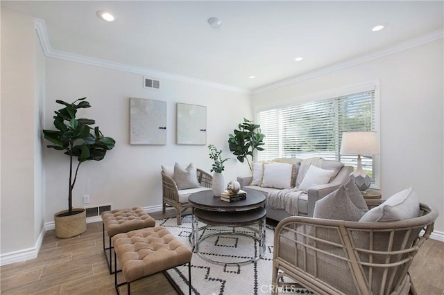 living room with crown molding and light wood-type flooring