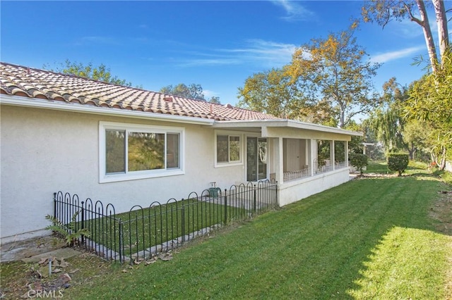 view of property exterior featuring a lawn