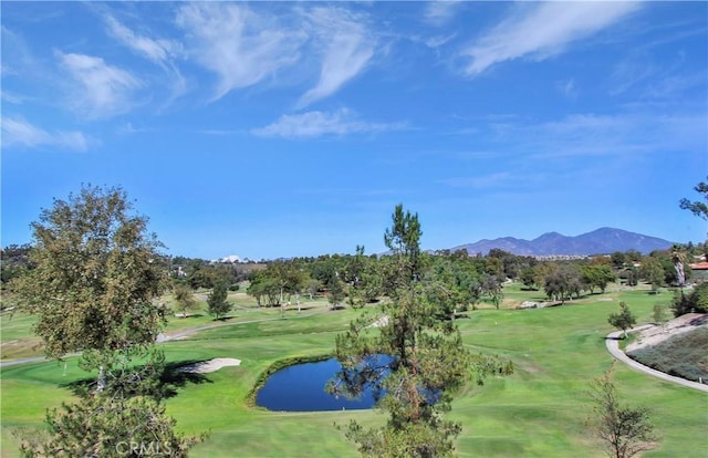 view of community featuring a water and mountain view