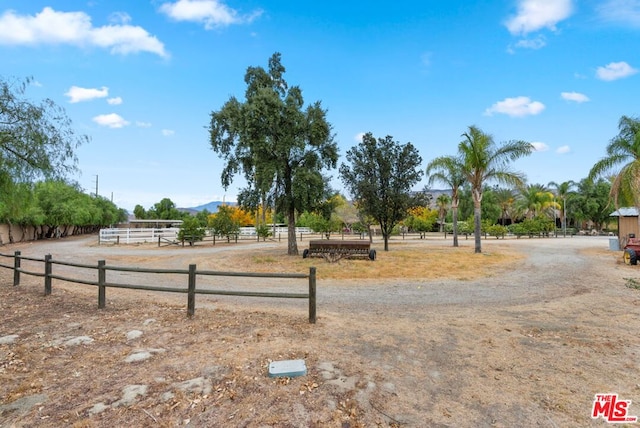 exterior space with a rural view