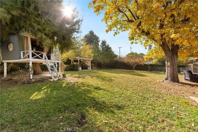 view of yard with a pergola