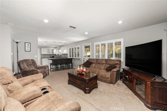 living room with light carpet