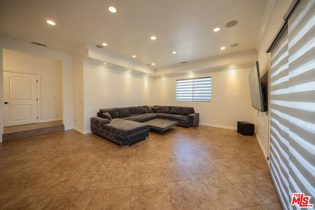 living room with ornamental molding