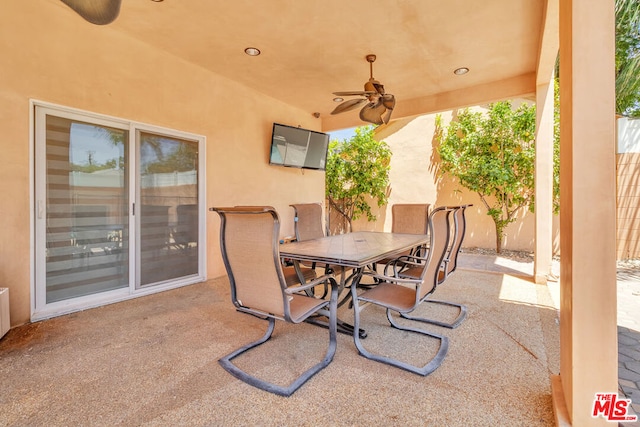 view of patio / terrace featuring ceiling fan