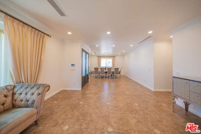 tiled living room with crown molding