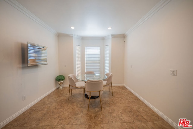 dining room with crown molding