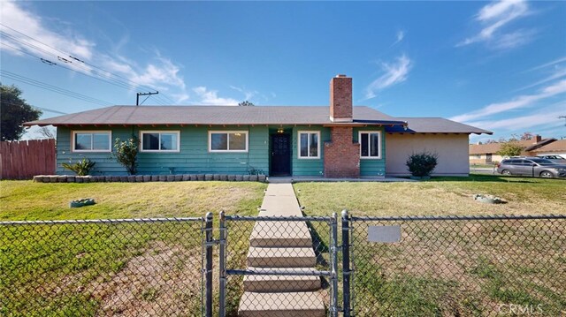 ranch-style home with a front lawn