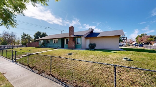 ranch-style home with a front lawn