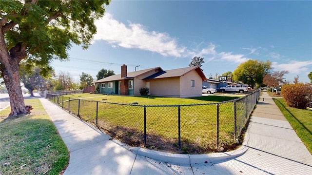 view of side of property featuring a yard