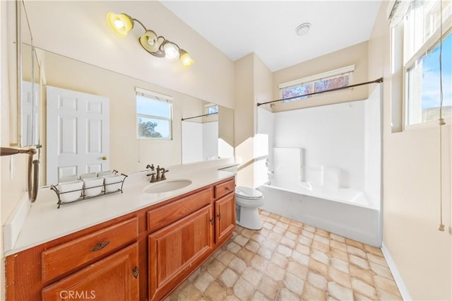 full bathroom with vanity, shower / bath combination, and toilet