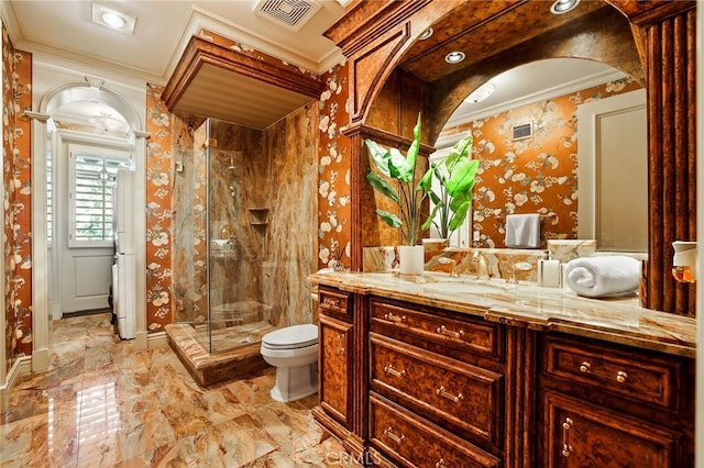 bathroom with crown molding, a shower with door, vanity, and toilet