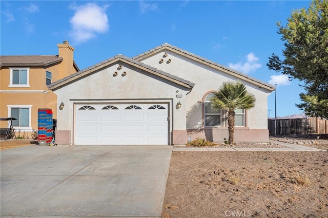 view of front of home featuring a garage