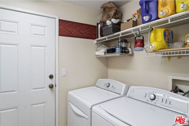 laundry area featuring washer and dryer