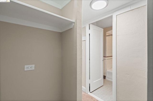 corridor with tile patterned flooring