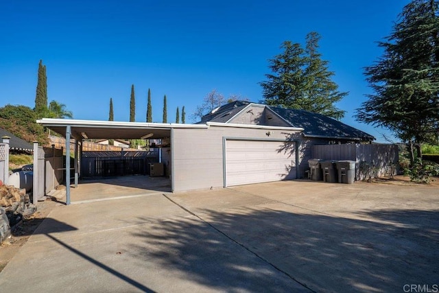 exterior space with a carport