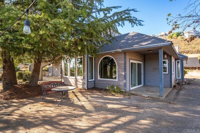 rear view of property with a patio area