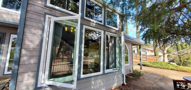 view of side of home featuring a patio area