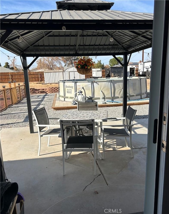 view of patio featuring a gazebo