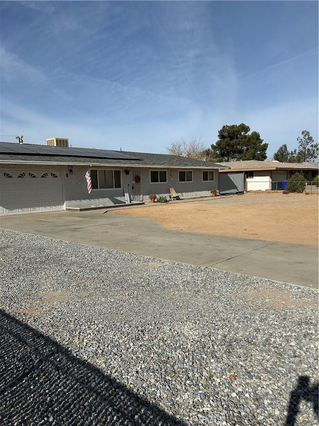 ranch-style home with a garage