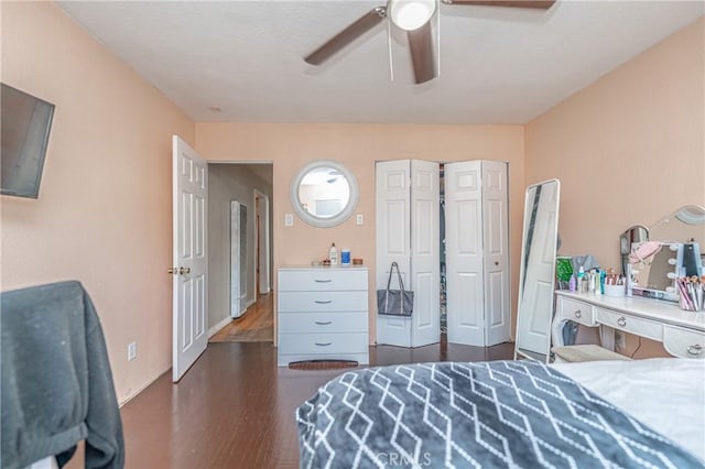 bedroom featuring ceiling fan and dark wood-type flooring