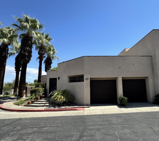 adobe home with a garage