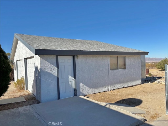 exterior space featuring a garage