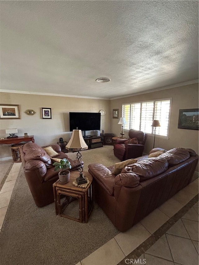 tiled living room featuring ornamental molding and a textured ceiling