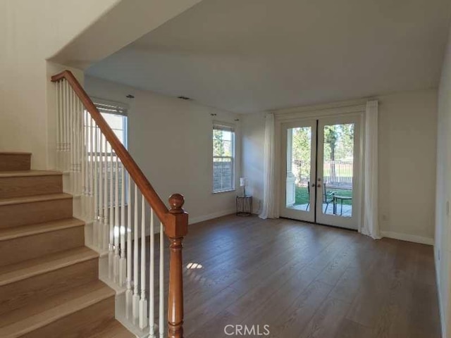 doorway to outside featuring hardwood / wood-style flooring and french doors