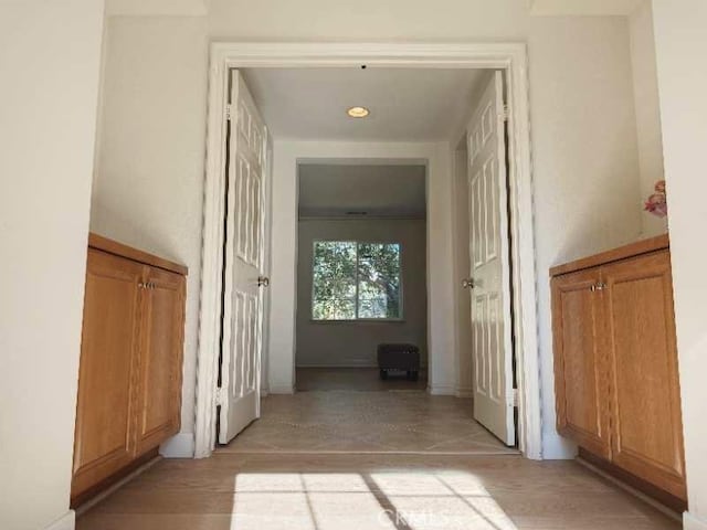 hall featuring light hardwood / wood-style flooring