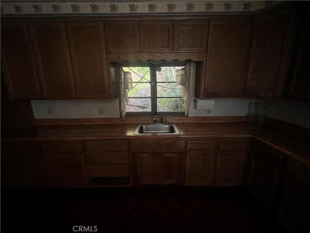 kitchen featuring a sink