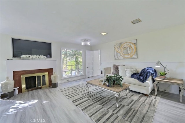 living room with light hardwood / wood-style floors