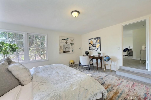 bedroom featuring hardwood / wood-style floors