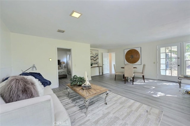 living room with light wood-type flooring