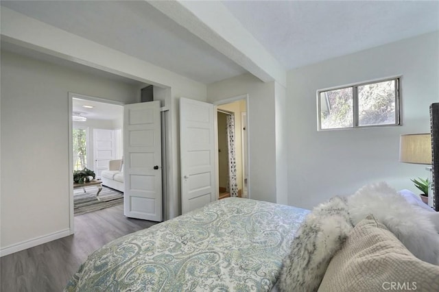 bedroom with wood-type flooring