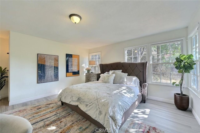 bedroom featuring light hardwood / wood-style floors