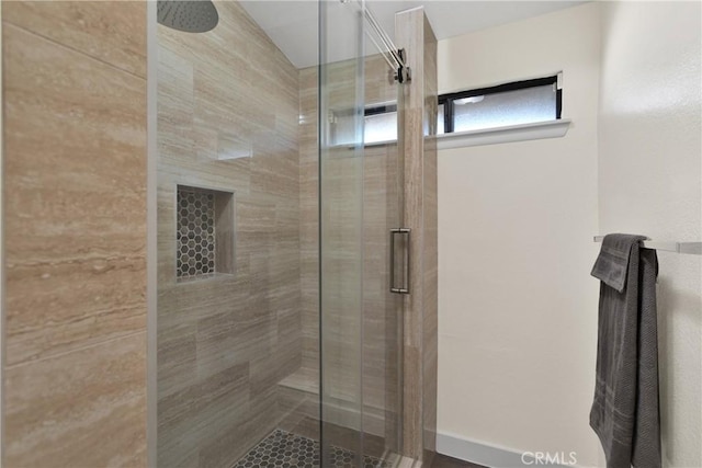 bathroom with an enclosed shower