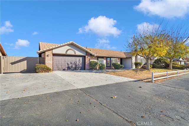 ranch-style house featuring a garage