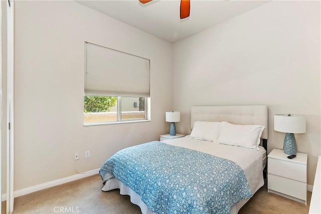 bedroom featuring ceiling fan and carpet flooring