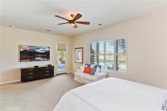 bedroom with light carpet, ceiling fan, and access to exterior