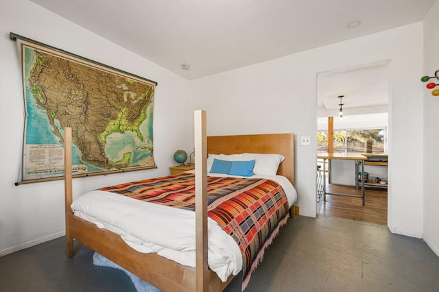 bedroom featuring dark hardwood / wood-style flooring