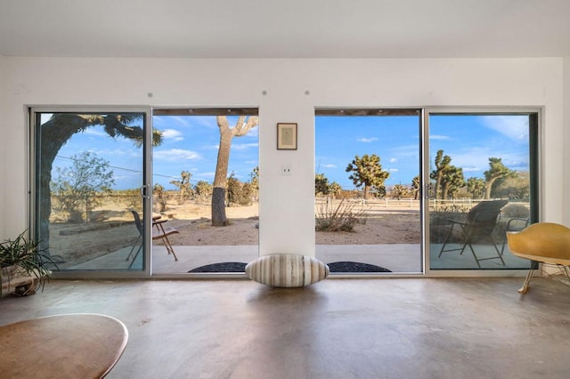 doorway featuring concrete floors